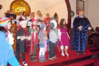 members of the community choir in Verona performed Good King Wenceslas with Ralph McInnes as the king and the talented young singer Ava Ludlow as the page at their “Spirit of Advent” concert at Trinity United in Verona on December 5